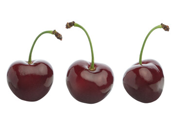 Cherry with green leaves on white isolated background
