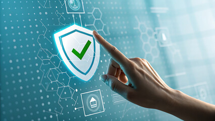 A finger touches a digital shield with a checkmark, representing cybersecurity, data protection, and online safety in the digital age