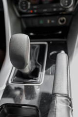 Gearshift and handbrake of luxury interior of car