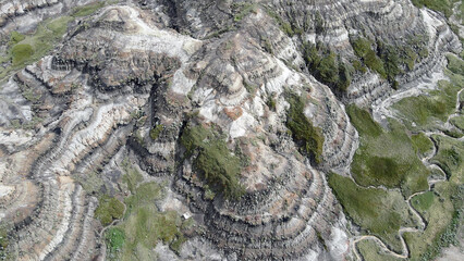 Drumheller Alberta Canada Aerial View of Rugged Badlands Terrain With Eroded Hills and Vegetation, ...