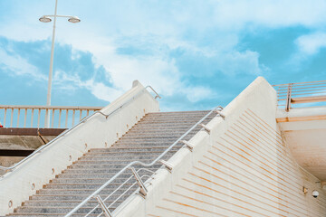 Concrete Stairway with Railings and Sky