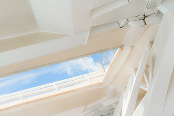 Modern White Bridge Structures Framing Blue Sky
