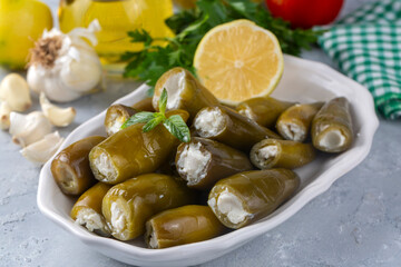 Cheese filled pickled jalapeno peppers