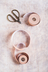 Beige special physical tapes for face and body on the table top and vertical view