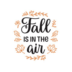 Fall is in the air hand lettering composition with autumn leaves