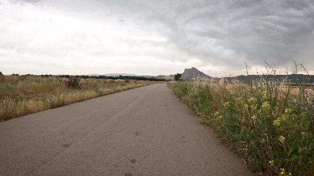 Camino Mozarabe de Santiago - a paved road leaving Antequera, province of Malaga, Andalusia, Spain