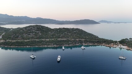 Coastal mountain landscape, sea resort yachts, golden hour