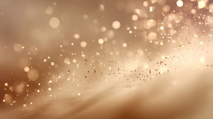 Obraz premium Soft bokeh light particles floating over warm beige textured background