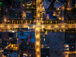 Aerial view of illuminated intersection and construction in Amsterdam South
