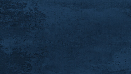 wall is a deep blue color and has a textured surface. The texture gives the wall a unique and interesting appearance