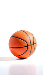 Fototapeta premium orange basketball on glossy white surface, softly lit studio scene 