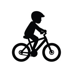 Obraz premium Silhouette of a child kid riding a bicycle with helmet