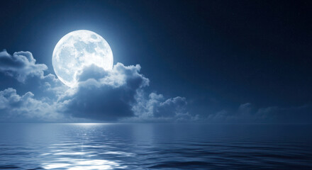 Luminous full moon shines brightly through wispy clouds over calm ocean waters