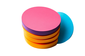 Stack of vibrant colorful paper circles on white