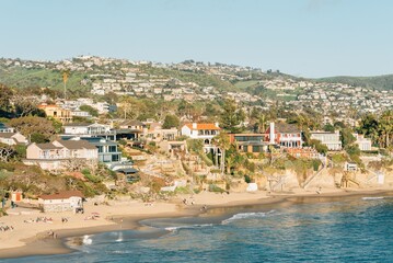 View of beach, houses and hills from Crescent Bay Point Park, in Laguna Beach, Orange County, California © jonbilous