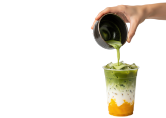 iced mango matcha latte pouring into a plastic cup