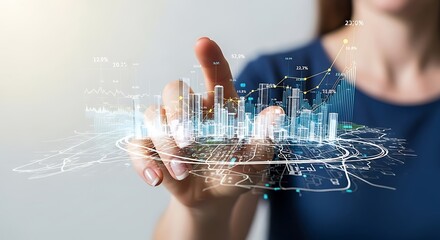 Hand touching a futuristic city hologram with data streams