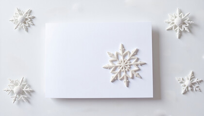 White Christmas card with snowflake decoration on light background  