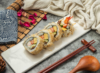Exquisite Bonito Fried Shrimp Sushi Rolls with Fresh Ingredients and Crisp Topping in tray side view of hong kong food