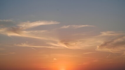 Fototapeta premium Beautiful sunset sky background wallpaper orange blue gradient clouds nature view hd