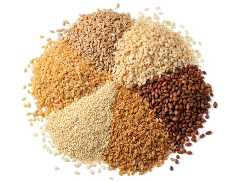 Vibrant overhead view circular arrangement of assorted whole grains including quinoa, brown rice, barley against clean white background. Detailed display emphasizes healthy eating choices, raw