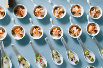 Gourmet Canapes on White Serving Spoons