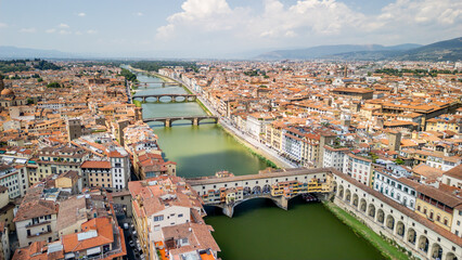 The Arno River and the Italian city of Florence on both banks of the river. 