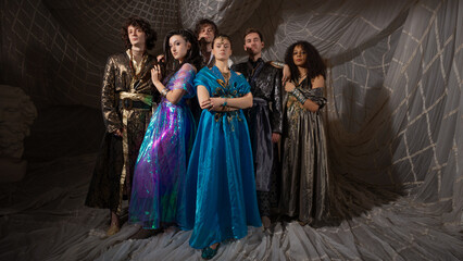 Ottoman Empire inspired group portrait, young models in historical costumes, fantasy aesthetic