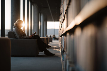 in modern library librarian adeptly navigates through digital tools while assisting patron