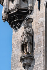 Old Town Hall of Gouda (Stadhuis van Gouda, 1448 - 1450), it is one of oldest Gothic city halls in the Netherlands. Architectural fragments of the facade. Gouda, the Netherlands.