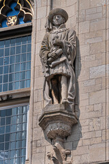 Old Town Hall of Gouda (Stadhuis van Gouda, 1448 - 1450), it is one of oldest Gothic city halls in the Netherlands. Architectural fragments of the facade. Gouda, the Netherlands.