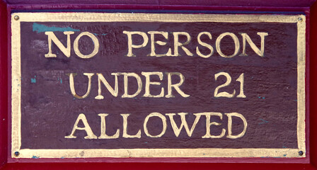 NO PERSON UNDER 21 ALLOWED sign