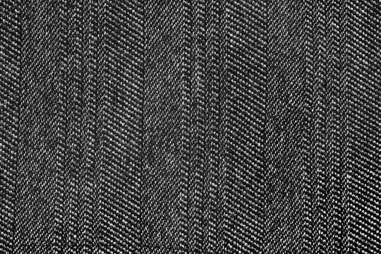 herringbone pattern fabric, texture background. black and white tweed pattern, weaving, textile material. close up wool background, texture for graphic design