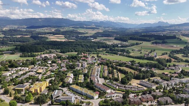 Aerial Video over Fribourg,  near the bois de monceur in Moncor with view of Swiss prealps