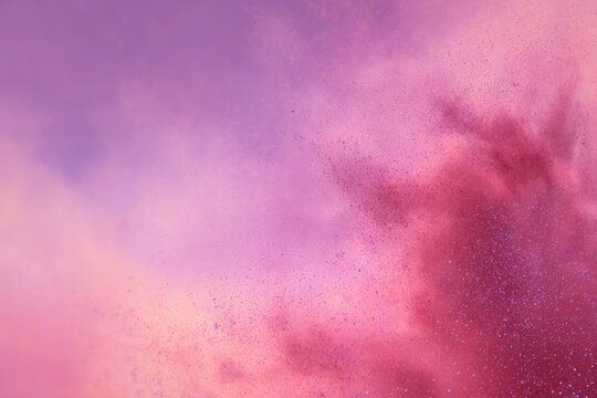 Dreamy pink and purple hues blend in an ethereal spectacle like a cosmic cloud of cotton candy melting into a pastel sky