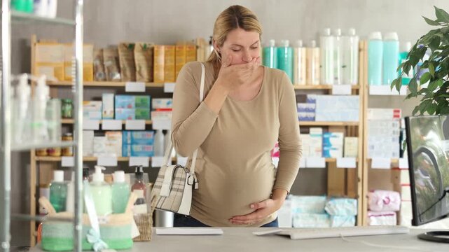  Unhappy pregnant woman buyer with vomiting in pharmacy. High quality 4k footage