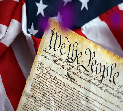 U.S. Constitution Preamble with American Flag on Vintage Paper - Patriotic Background"