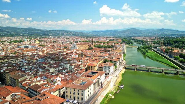 The Arno river in the city of Florence, Italy. 4K, high quality.