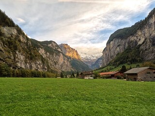 Valley at Lauterbrunnen, Switzerland showing majestic peaks of the Swiss Alps.