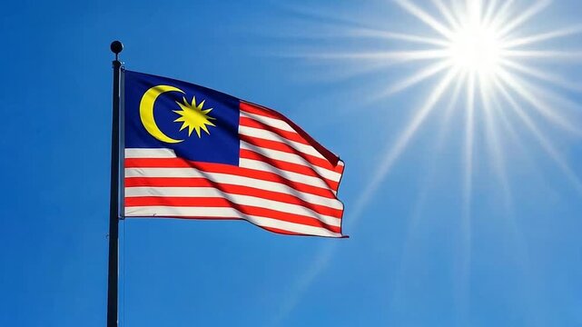 Malaysia Flag Jalur Gemilang Waving Stripes and Crescent Wind Blue Sky