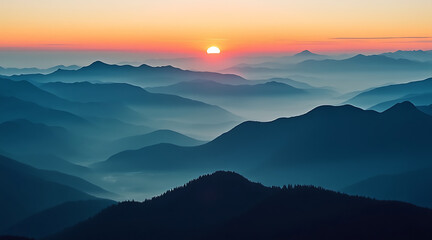 Fototapeta premium Misty mountain range at sunrise with golden sun and blue hues