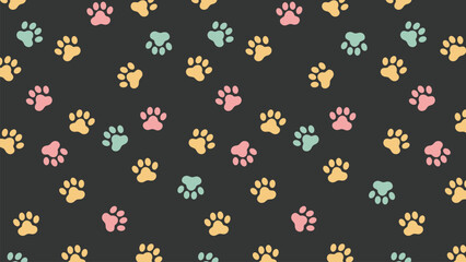 Dark gray background adorned with a colorful pattern of pink, yellow, and teal paw prints. A fun, seamless vector for various designs