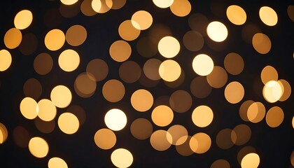 Golden bokeh lights on black background