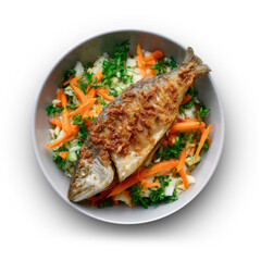 Crunchy fried fish resting on colorful vegetable salad with carrots, top view in bowl, isolated PNG. 