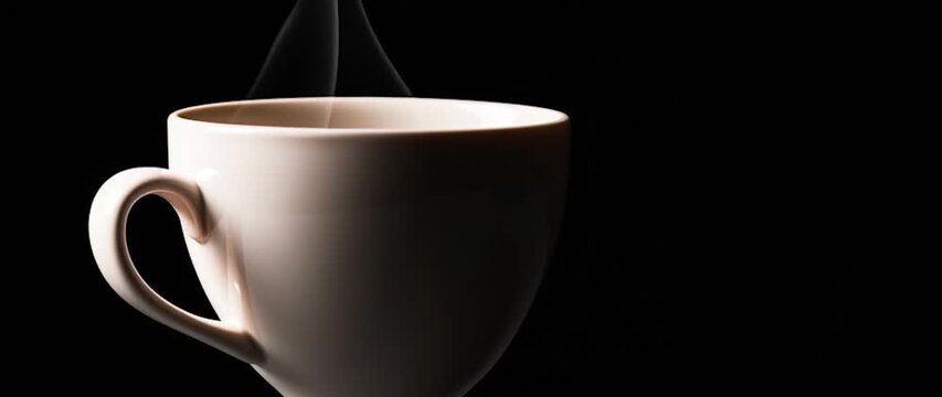 Anamorphic video floating cup of coffee on a black background, white ceramic hot coffee cup with steam float up from cup on dark background