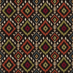Ikat fabric patterns represent traditional indigenous art. Repeating geometric patterns.Aztec geometric print,folk embroidery are perfect for textile designs, rugs, curtains or bohemian and tribal.