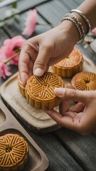 A group of hands with rings over a round pastry