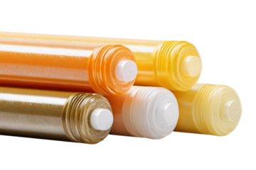 Group of Glue Sticks Lying Horizontally with One Open Stick Showing Glue Tip, Side Angle View, Isolated on Transparent Background