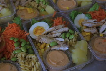 Vegetable salad served in a plastic cup can be packed to take away