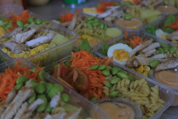 Vegetable salad served in a plastic cup can be packed to take away